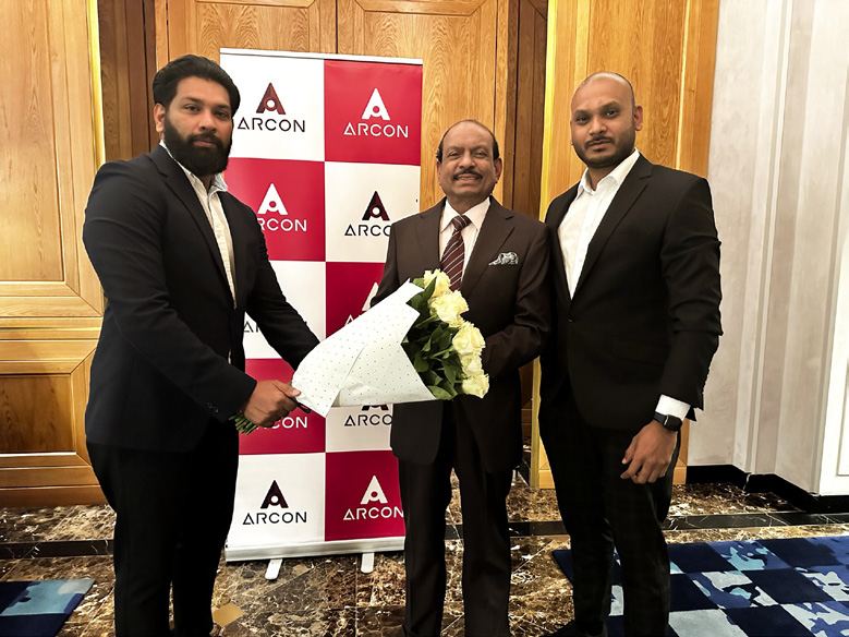 Muneer Shaikh welcoming a guest at an Arcon event